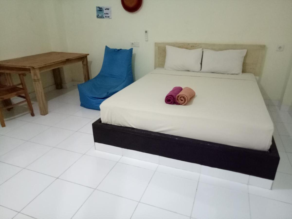 Amed Stop Inn Homestay, Rooftop Restaurant And Bar Exterior foto